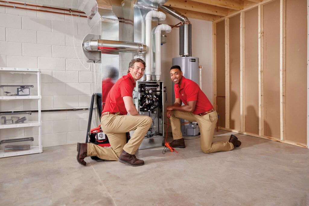 Ace Hardware Home Services techs performing a furnace repair in South Jersey